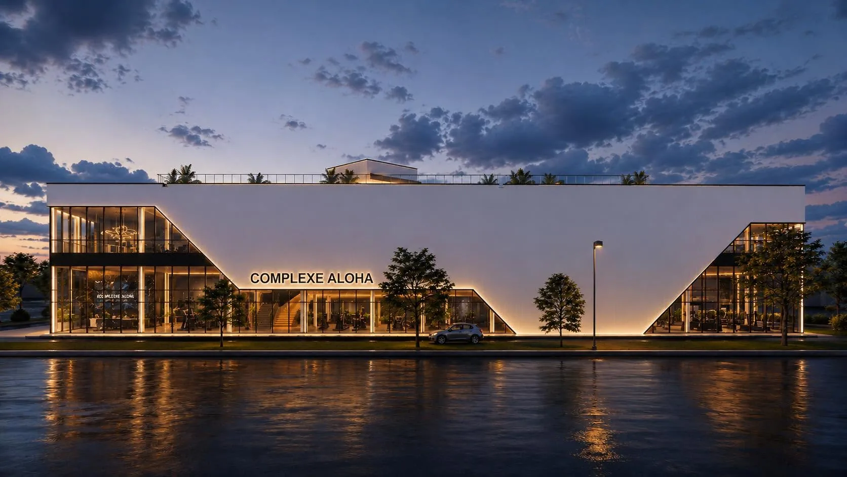Façade du complexe Atlantis Cité à Québec au crépuscule, éclairage doré